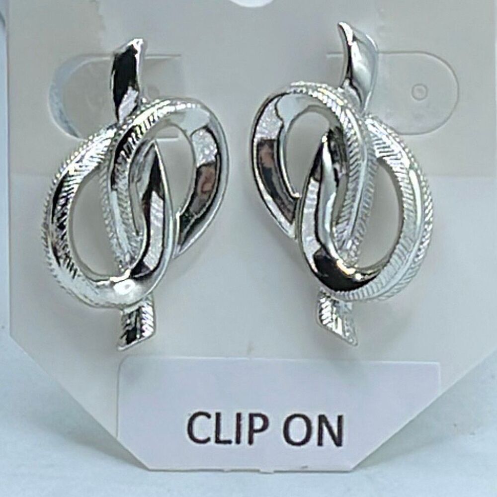 Vintage Coro textured smooth interlocking knot clip earrings.